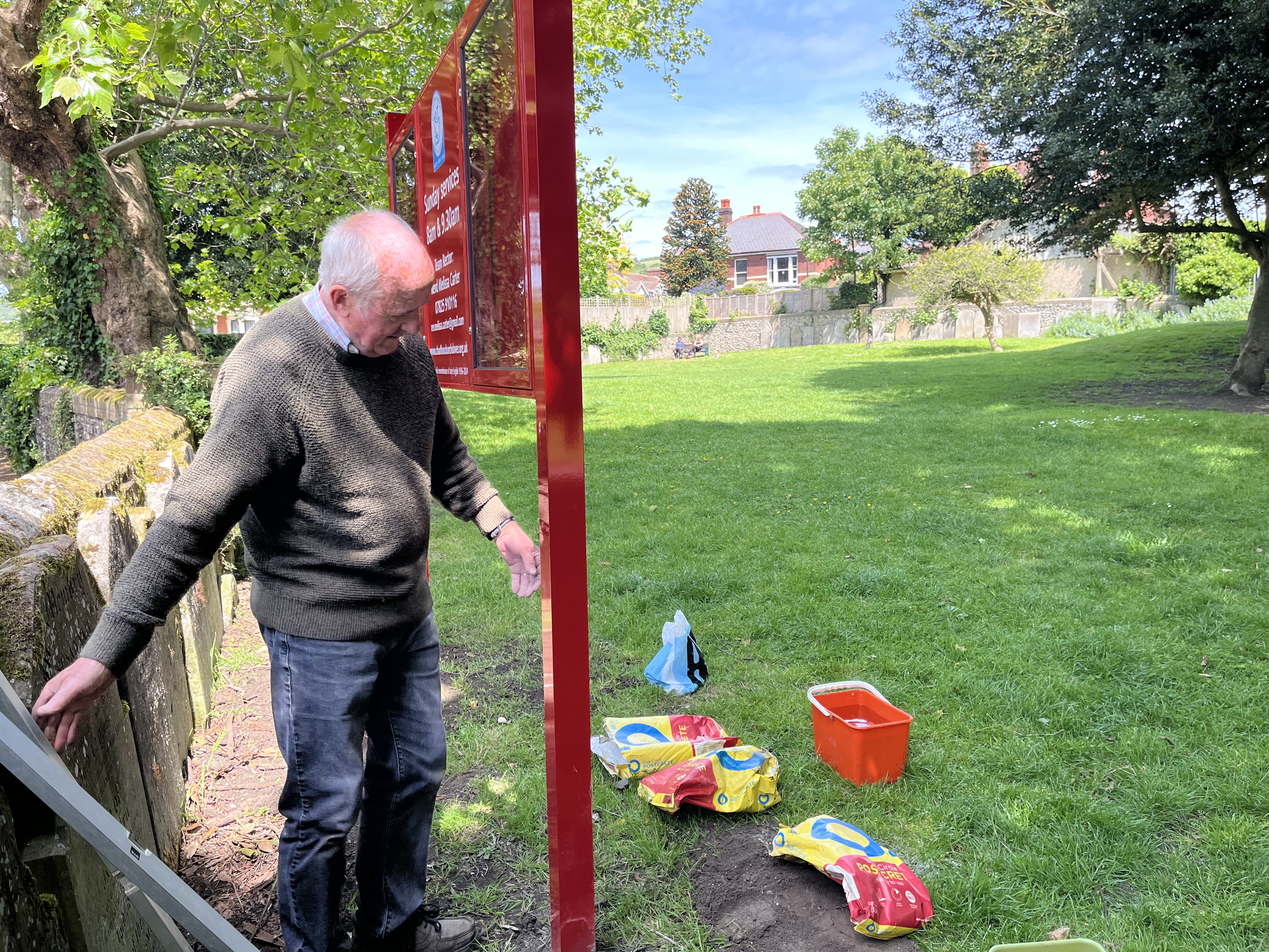 jim with noticeboard